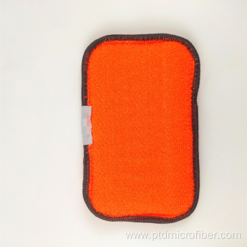 Microfiber cleaning sponge with scrubbing back